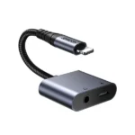 Joyroom SY-L01 2-in-1 Lightning to 3.5mm and Lightning Adapter for iPhone, iPad, and iPod, allowing simultaneous audio listening and device charging.
