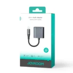 Joyroom SY-L01 2-in-1 Lightning to 3.5mm and Lightning Adapter for iPhone, iPad, and iPod, allowing simultaneous audio listening and device charging.